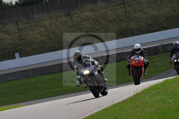 Motorcycle action photographs;Rockingham;Rockingham photographs;event digital images;eventdigitalimages;no limits trackday;peter wileman photography;rockingham corby northamptonshire;trackday;trackday digital images;trackday photos