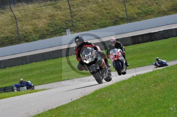 Motorcycle action photographs;Rockingham;Rockingham photographs;event digital images;eventdigitalimages;no limits trackday;peter wileman photography;rockingham corby northamptonshire;trackday;trackday digital images;trackday photos